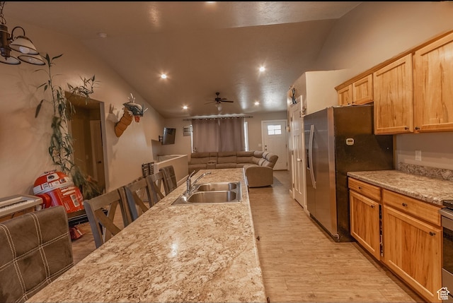 660 E 400 N, Spring City, UT 84662 - kitchen featuring a sink, a ceiling fan, stainless steel fridge with ice dispenser, open floor plan, and light wood-style floors