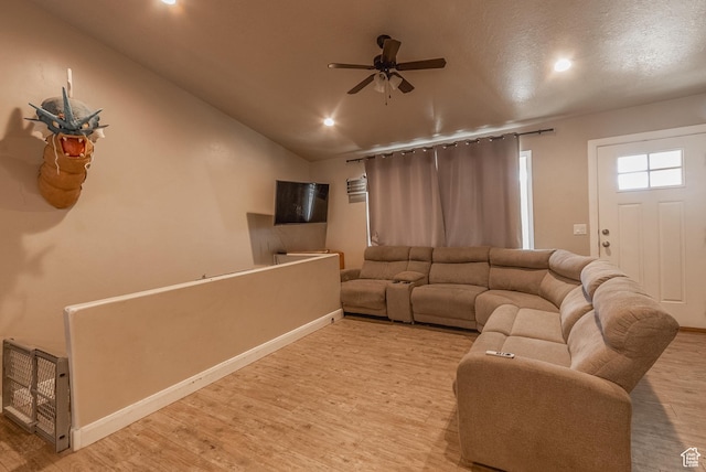 660 E 400 N, Spring City, UT 84662 - living room featuring light wood-style flooring, baseboards, vaulted ceiling, and ceiling fan