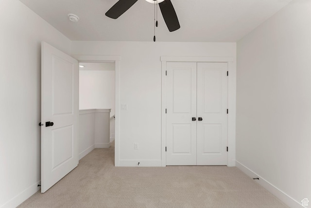 518 W Olive Ln, St George, UT 84790 - unfurnished bedroom featuring light carpet, a closet, and a ceiling fan