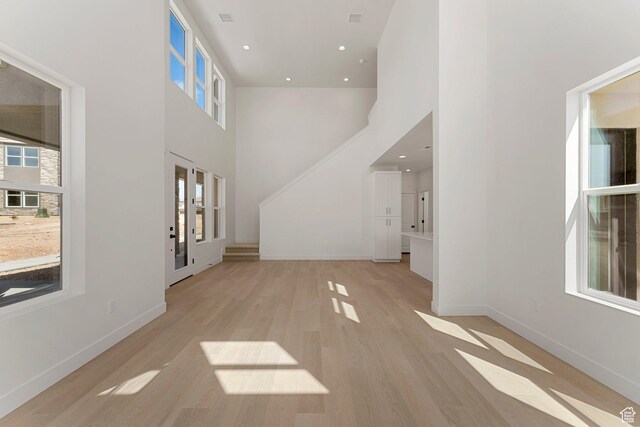 518 W Olive Ln, St George, UT 84790 - entryway with light wood-style floors, a high ceiling, and recessed lighting