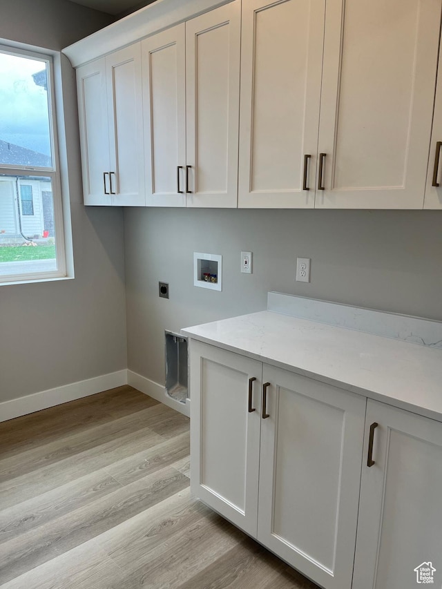 335 E 340 S, Kamas, UT 84036 - laundry room featuring hookup for an electric dryer, hookup for a washing machine, baseboards, light wood finished floors, and cabinet space