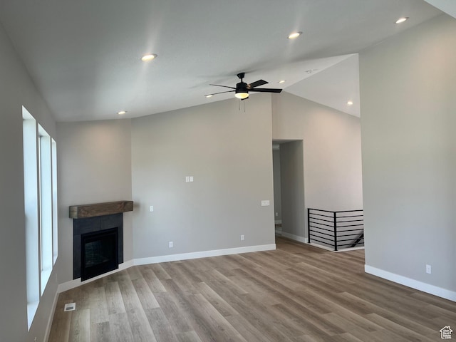335 E 340 S, Kamas, UT 84036 - unfurnished living room with baseboards, ceiling fan, wood finished floors, recessed lighting, and vaulted ceiling