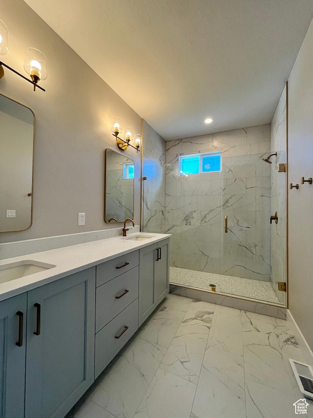 335 E 340 S, Kamas, UT 84036 - full bathroom featuring visible vents, marble finish floor, double vanity, a marble finish shower, and a sink