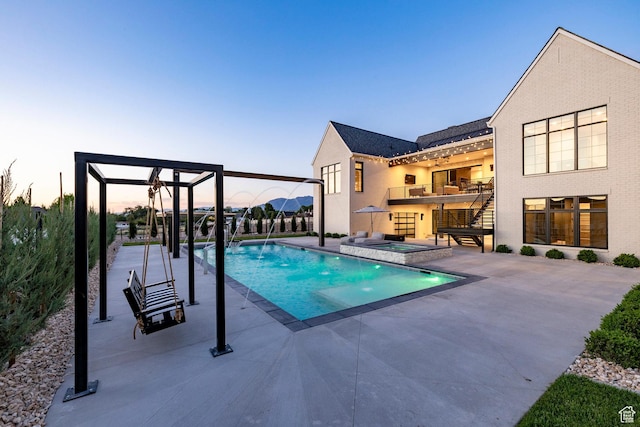 13926 S Jarvie Ln E, Draper, UT 84020 - view of pool featuring a patio area and a pool with connected hot tub