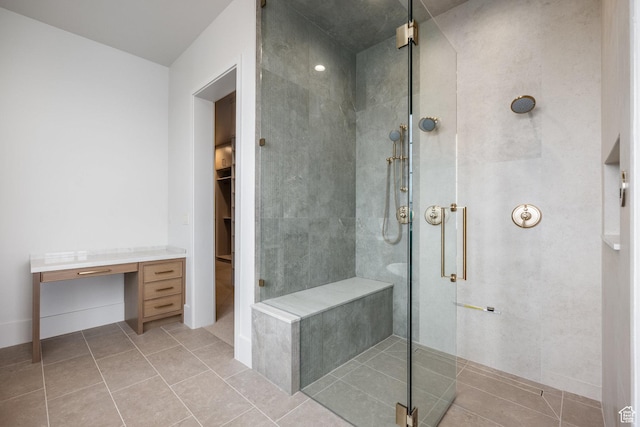 13926 S Jarvie Ln E, Draper, UT 84020 - bathroom featuring a stall shower, tile patterned flooring, and a walk in closet
