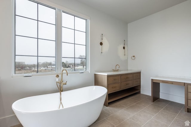 13926 S Jarvie Ln E, Draper, UT 84020 - full bathroom with tile patterned flooring, a soaking tub, and vanity