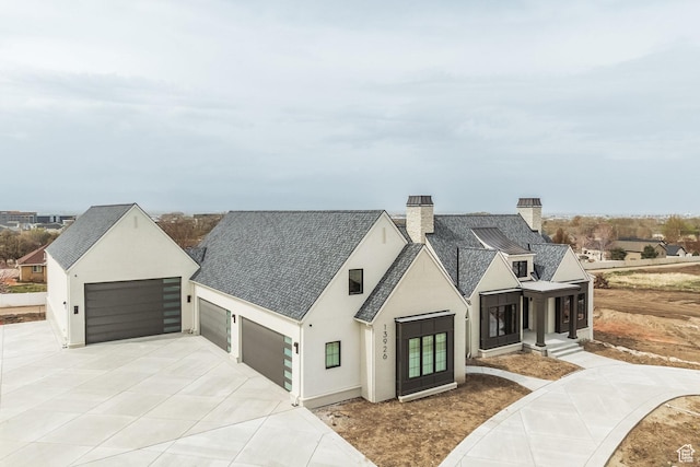 13926 S Jarvie Ln E, Draper, UT 84020 - modern farmhouse with stucco siding, concrete driveway, a shingled roof, and a chimney