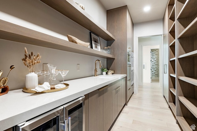13926 S Jarvie Ln E, Draper, UT 84020 - indoor wet bar featuring light wood finished floors and wine cooler