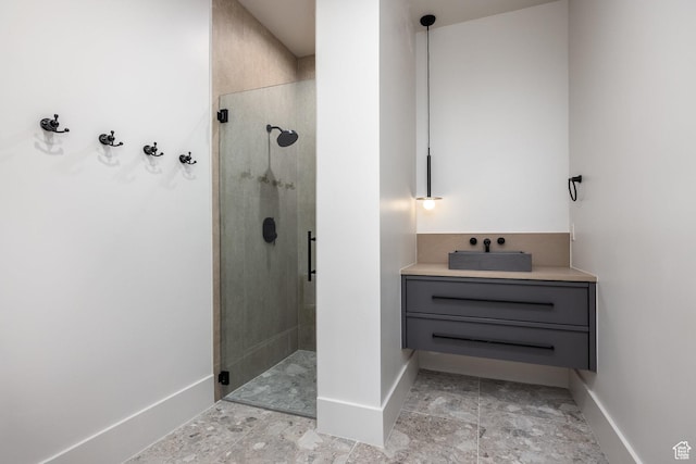 13926 S Jarvie Ln E, Draper, UT 84020 - full bath featuring a sink, a stall shower, and baseboards