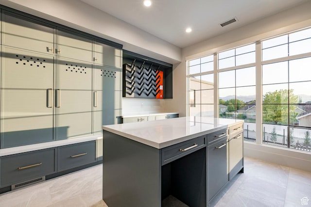 13926 S Jarvie Ln E, Draper, UT 84020 - kitchen with gray cabinets, light countertops, recessed lighting, a center island, and a mountain view