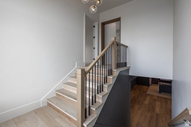 13926 S Jarvie Ln E, Draper, UT 84020 - stairway with baseboards and wood finished floors