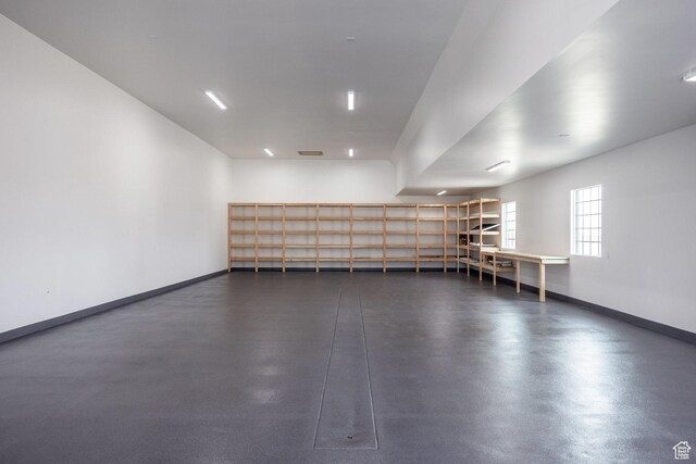 13926 S Jarvie Ln E, Draper, UT 84020 - garage featuring baseboards