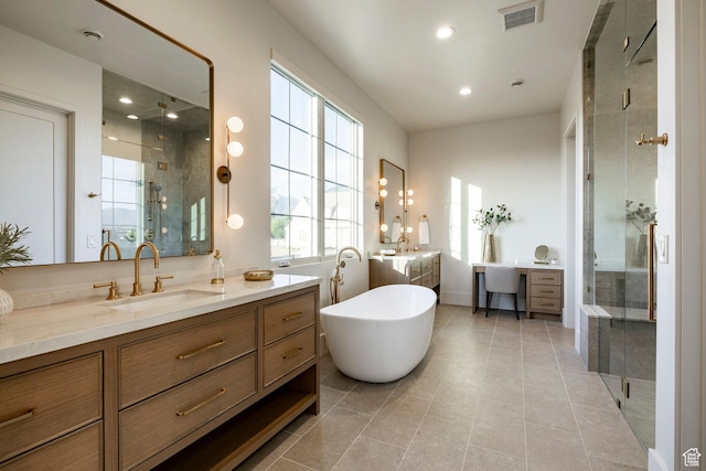 13926 S Jarvie Ln E, Draper, UT 84020 - full bathroom with a stall shower, two vanities, a soaking tub, recessed lighting, and tile patterned flooring
