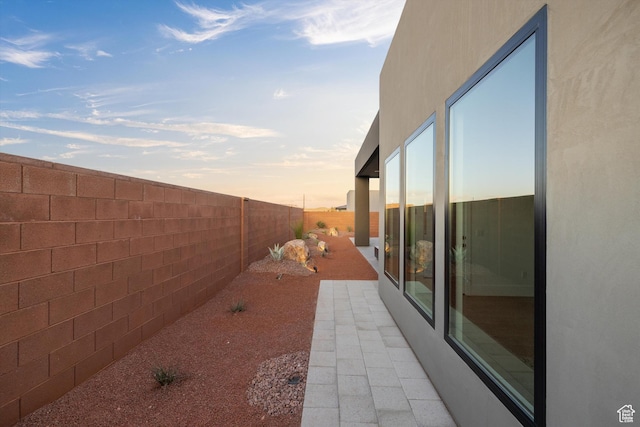 121 E Terrace Ln, Ivins, UT 84738 - view of side of home with a fenced backyard and stucco siding