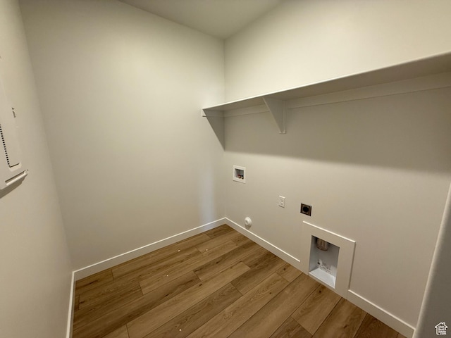 6 S 3830 W Unit 417, West Point, UT 84015 - washroom featuring hookup for a washing machine, hookup for an electric dryer, light wood-style floors, baseboards, and laundry area