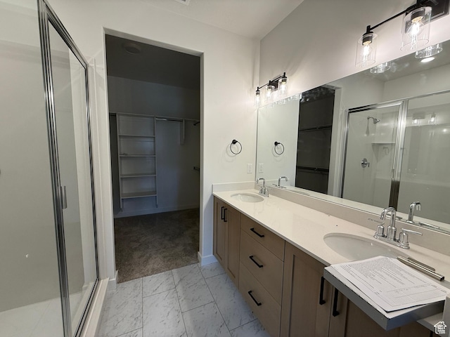 6 S 3830 W Unit 417, West Point, UT 84015 - full bathroom featuring marble finish floor, a sink, a shower stall, and a walk in closet