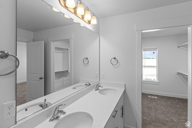 3175 S 208 W, Nibley, UT 84321 - full bath featuring baseboards, double vanity, and a sink