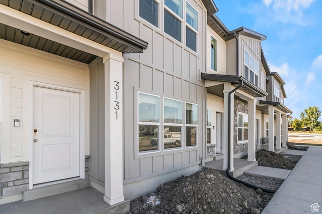 3175 S 208 W, Nibley, UT 84321 - property entrance featuring stone siding and board and batten siding