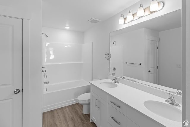 3175 S 208 W, Nibley, UT 84321 - full bath with double vanity, a sink, washtub / shower combination, and wood finished floors