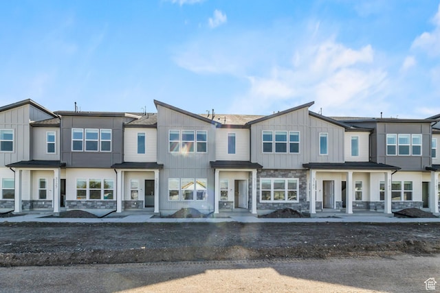 3175 S 208 W, Nibley, UT 84321 - view of property with stone siding and board and batten siding