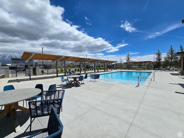 15 W Seasons Dr, Vineyard, UT 84059 - community pool with a patio area and outdoor dining area