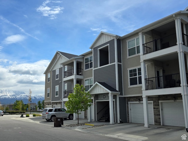 15 W Seasons Dr, Vineyard, UT 84059 - view of property featuring a mountain view and a garage
