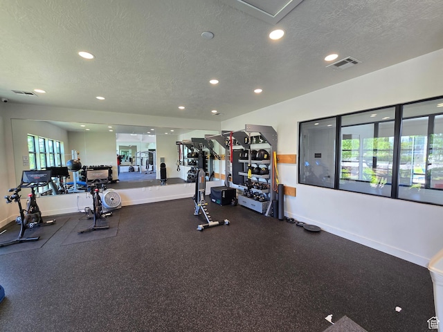 15 W Seasons Dr, Vineyard, UT 84059 - workout area featuring recessed lighting, baseboards, and a textured ceiling