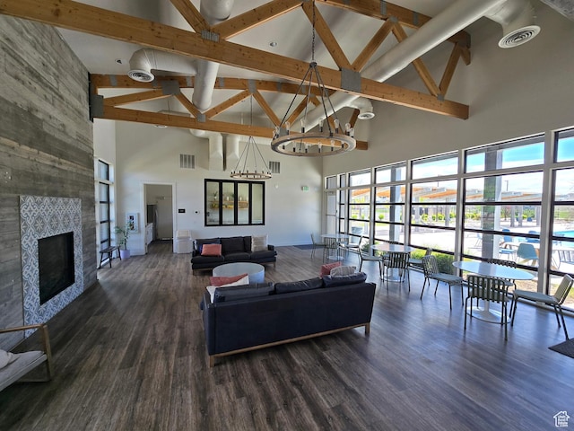 15 W Seasons Dr, Vineyard, UT 84059 - living room featuring high vaulted ceiling, beam ceiling, a chandelier, wood finished floors, and baseboards