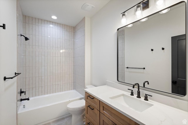 full bath with tub / shower combination, toilet, and vanity