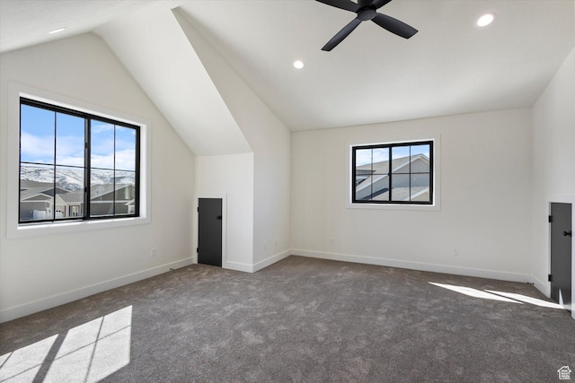 additional living space with baseboards, lofted ceiling, ceiling fan, and recessed lighting