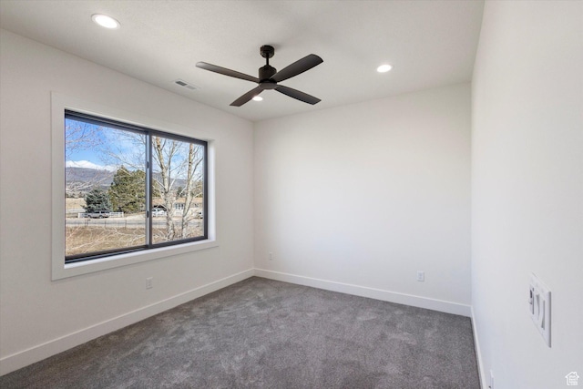 spare room featuring carpet flooring, baseboards, visible vents, ceiling fan, and recessed lighting
