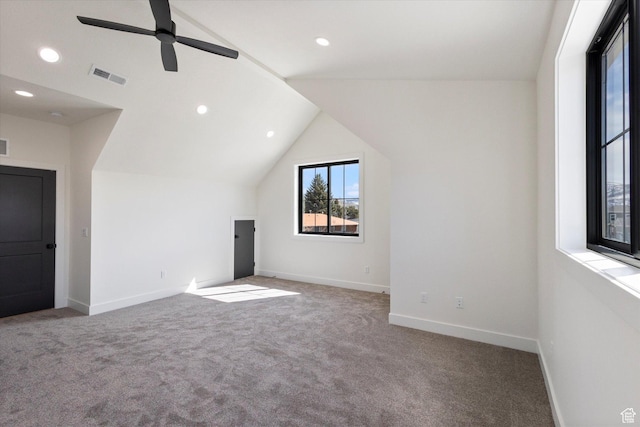 bonus room featuring carpet flooring, baseboards, vaulted ceiling, and visible vents