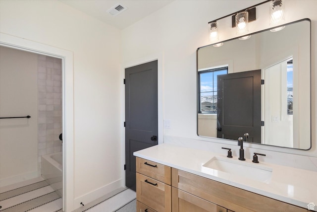 full bath with vanity, a bathtub, walk in shower, baseboards, and visible vents
