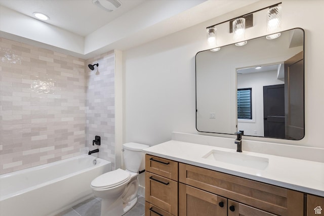 full bathroom featuring tile patterned floors, shower / tub combination, toilet, and vanity