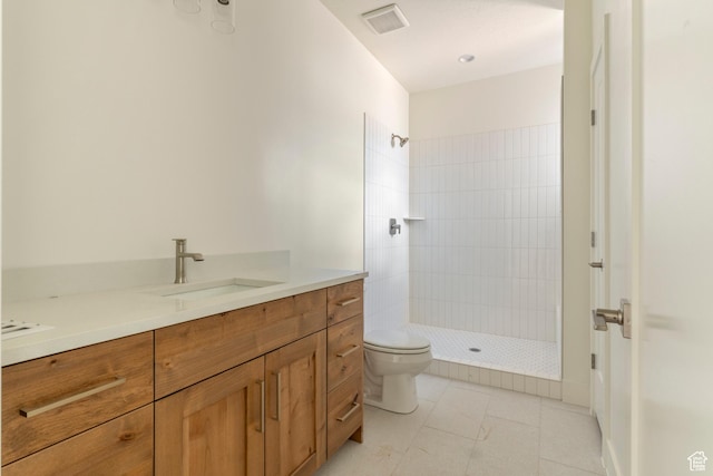 4416 W 1900 S, Cedar City, UT 84720 - bathroom with tiled shower, toilet, and vanity