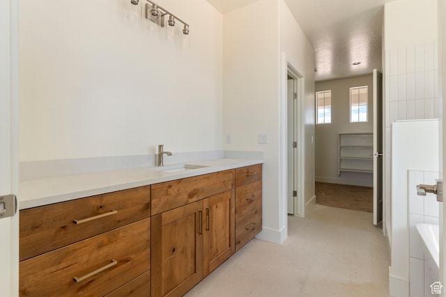 4416 W 1900 S, Cedar City, UT 84720 - full bath featuring vanity, a tub, and baseboards