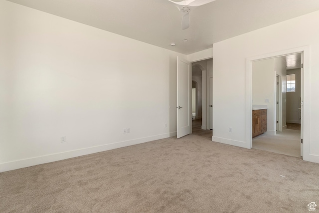 4416 W 1900 S, Cedar City, UT 84720 - unfurnished bedroom with arched walkways, light colored carpet, and baseboards