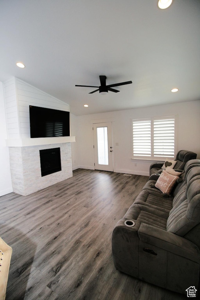 13207 S Weatherford Ln W, Herriman, UT 84096 - living area with wood finished floors, baseboards, a fireplace, and ceiling fan