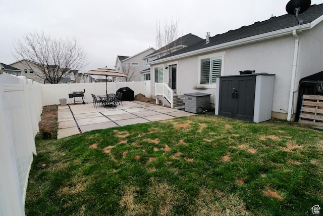 13207 S Weatherford Ln W, Herriman, UT 84096 - view of yard with a fenced backyard and a patio area