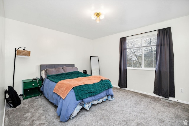105 W Penhurst Pl N, Logan, UT 84341 - bedroom featuring carpet, baseboards, and visible vents