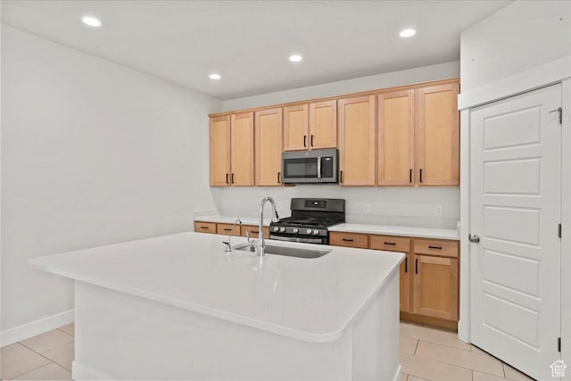 13192 S Lowick Ln, Herriman, UT 84096 - kitchen featuring light tile patterned flooring, light countertops, a sink, and appliances with stainless steel finishes