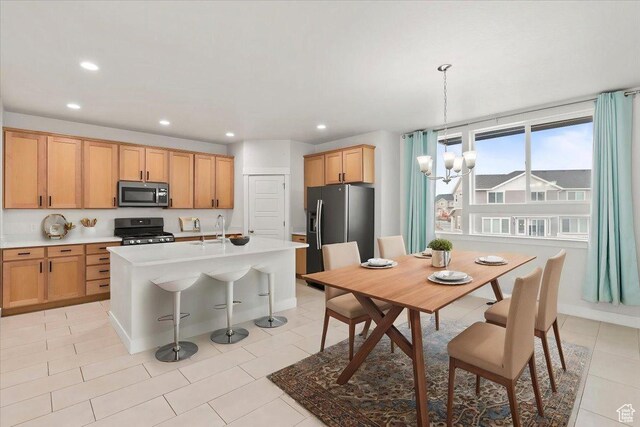 13192 S Lowick Ln, Herriman, UT 84096 - kitchen with a sink, stainless steel appliances, a notable chandelier, and recessed lighting