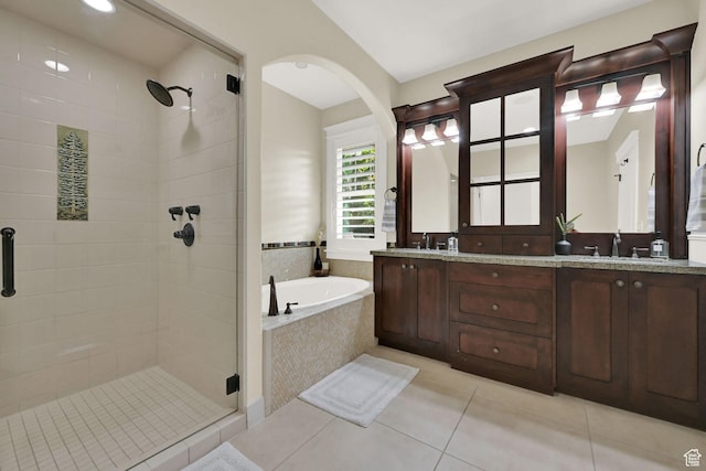 3059 S Lola Cir, Millcreek, UT 84109 - bathroom with a sink, a shower stall, tile patterned flooring, a bath, and double vanity