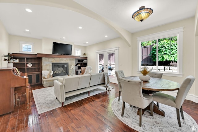 3059 S Lola Cir, Millcreek, UT 84109 - dining room with a stone fireplace, recessed lighting, and dark wood-style flooring
