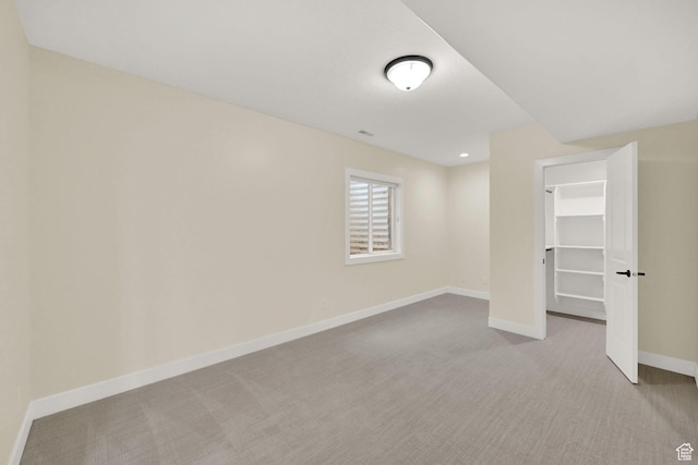 3059 S Lola Cir, Millcreek, UT 84109 - unfurnished bedroom with carpet flooring, a closet, a walk in closet, and baseboards