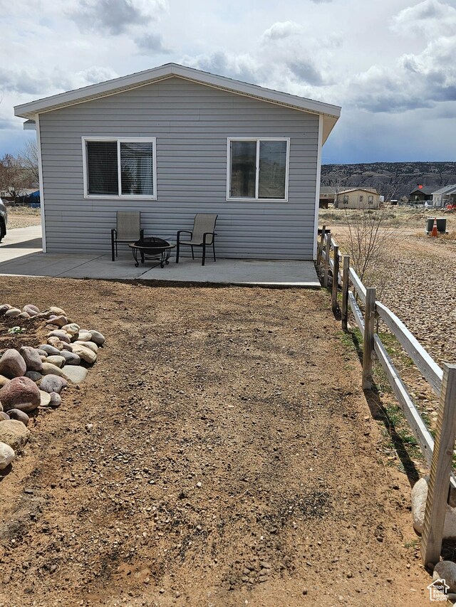 345 E 800 N, Duchesne, UT 84021 - rear view of house with a patio and fence