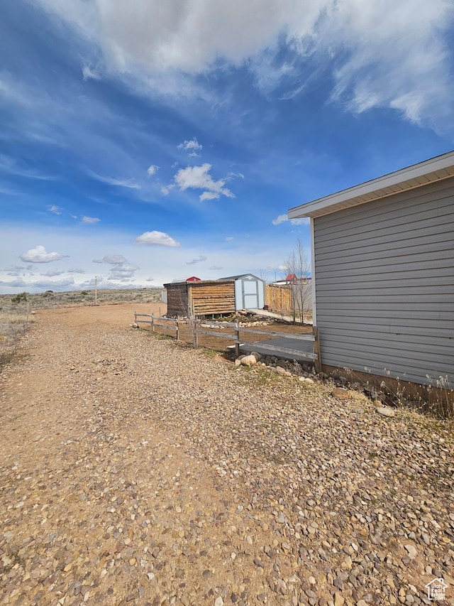 345 E 800 N, Duchesne, UT 84021 - view of yard featuring a shed, an outbuilding, and fence
