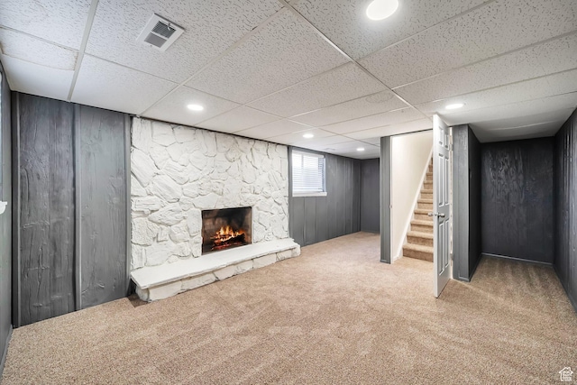 4195 W Kirkcaldy Cir S, South Jordan, UT 84009 - below grade area with a paneled ceiling, a fireplace, stairway, carpet floors, and visible vents