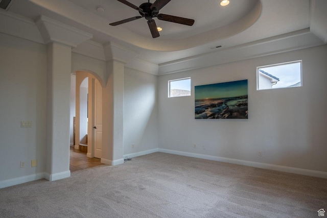 2104 S Corral Way, Washington, UT 84780 - carpeted spare room with arched walkways, a healthy amount of sunlight, and a raised ceiling