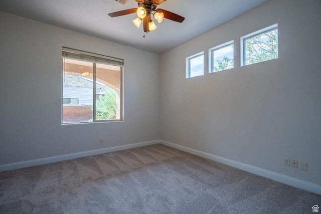 2104 S Corral Way, Washington, UT 84780 - carpeted spare room featuring baseboards and ceiling fan